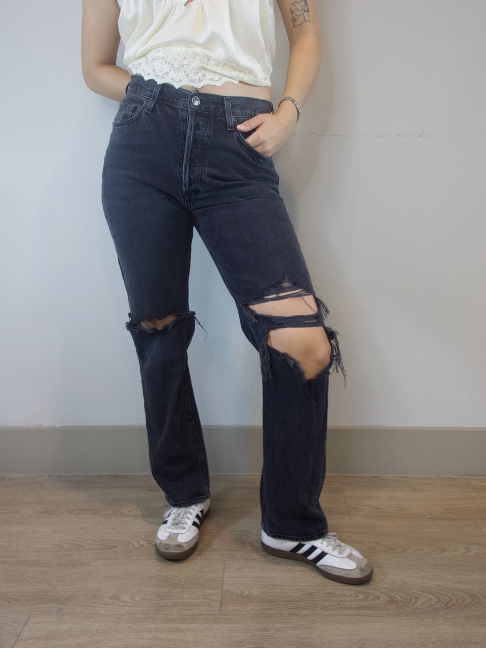 AGOLDE 90's Pinch Waist jeans in a washed black finish.